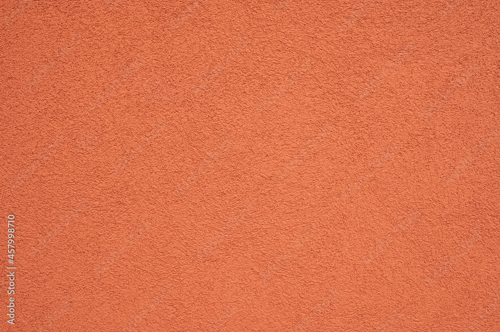 red colored concrete wall background texture with soft lighting red colored concrete wall background texture with soft lighting