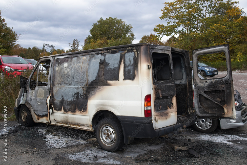 Remains of a burnt van outdoors