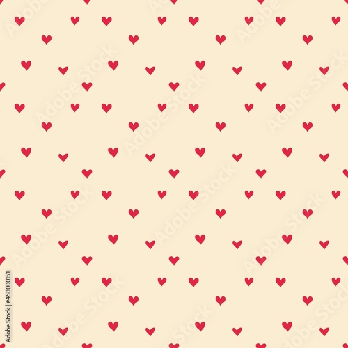 Red-scarlet hearts on a beige backdrop, seamless pattern - a romantic background for Valentine's Day.