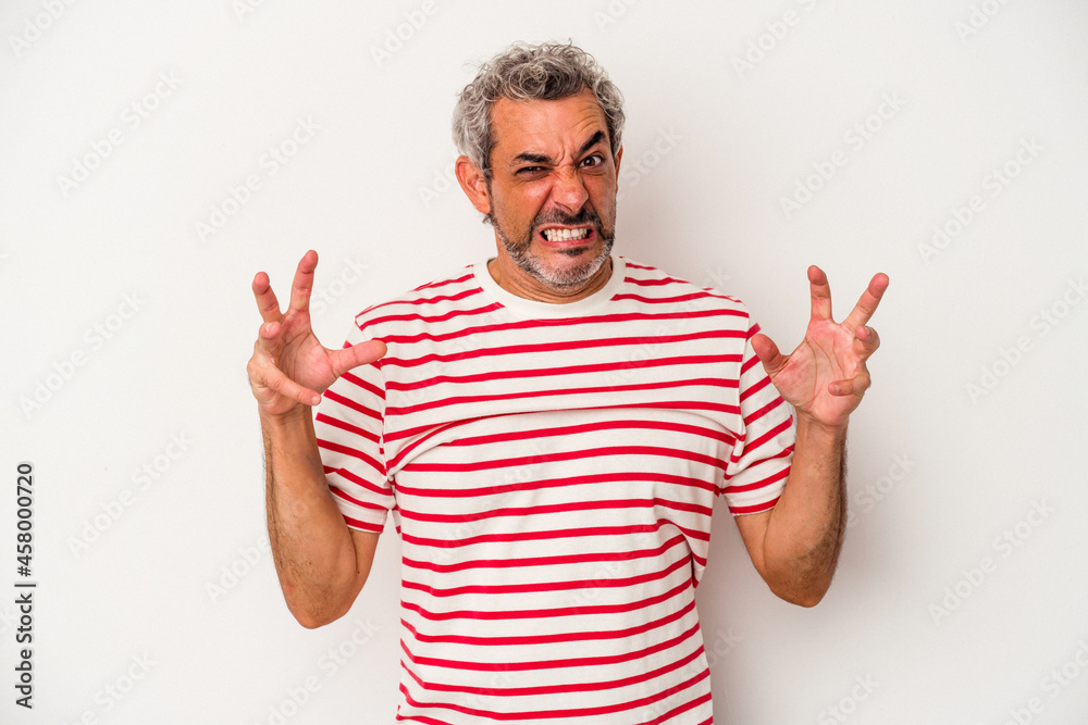 Naklejka premium Middle age caucasian man isolated on white background screaming with rage.