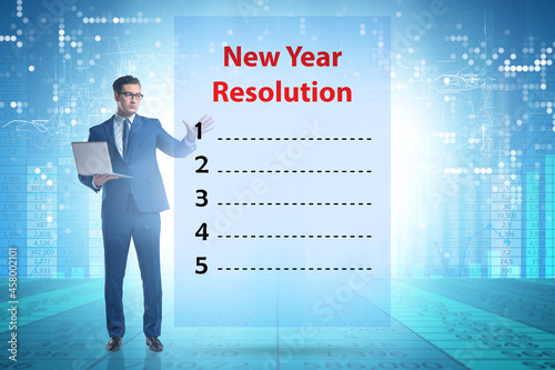 Businessman in new year resolution concept