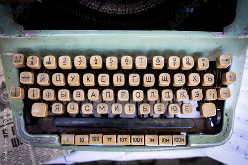 Antique typewriter cyrillic keys close up and russian keys selective focus photo