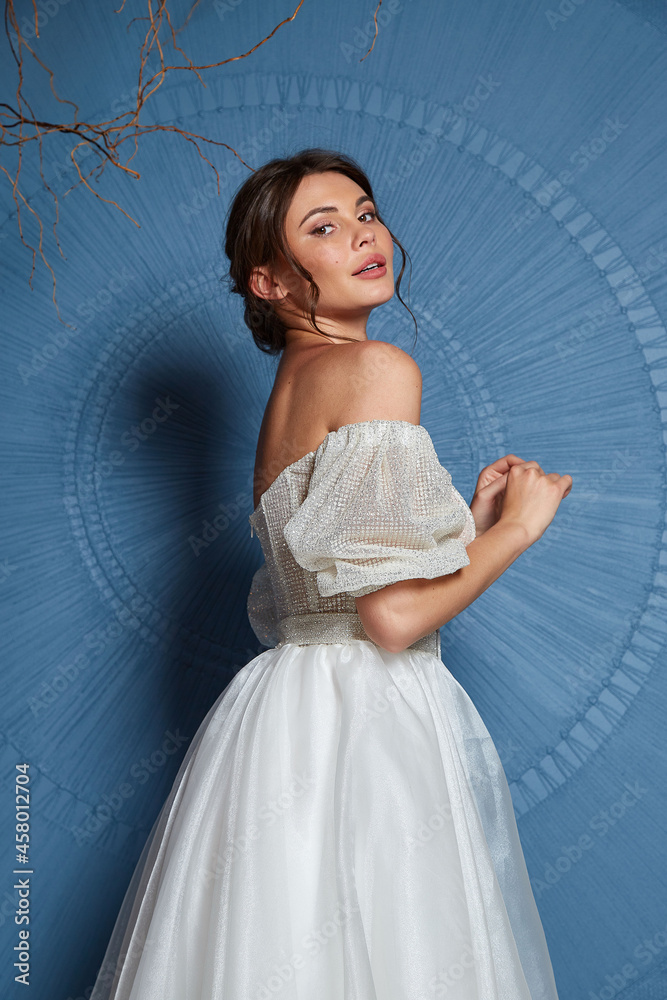 Sexy beautiful brunette woman pretty bride wedding big day marriage ceremony in summer garden wearing long silk and lace white dress bright makeup hairstyle pure love interior. Sexy beautiful brunette woman pretty bride wedding big day marriage ceremony in summer garden wearing long silk and lace white dress bright makeup hairstyle pure love interior.