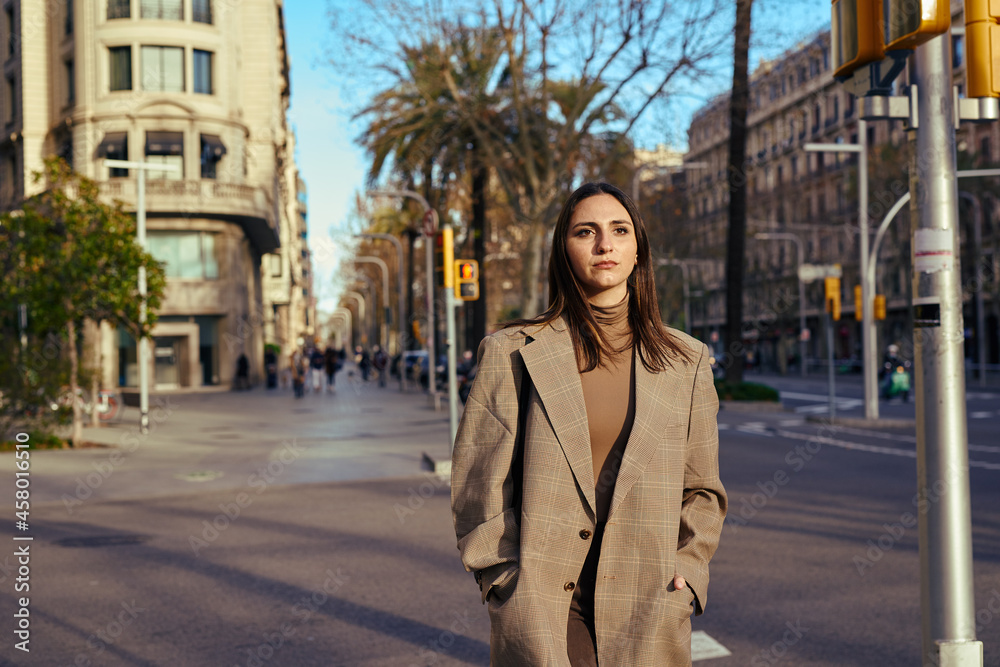 A faraway lady walking through the street