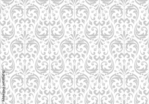 Wallpaper in the style of Baroque. Seamless vector background. White and gray floral ornament. Graphic pattern for fabric, wallpaper, packaging. Ornate Damask flower ornament.