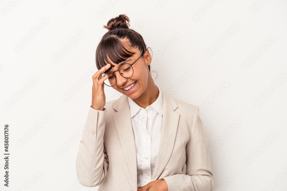 Young mixed race woman isolated on white background joyful laughing a lot. Happiness concept. Young mixed race woman isolated on white background joyful laughing a lot. Happiness concept.