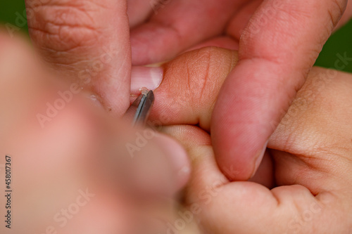 fingernail and manicure at a hand