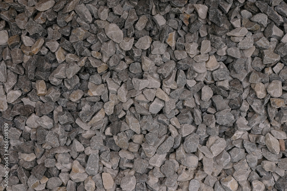 Small granite stones for design. Different shades of gray. Small granite stones for design. Different shades of gray.