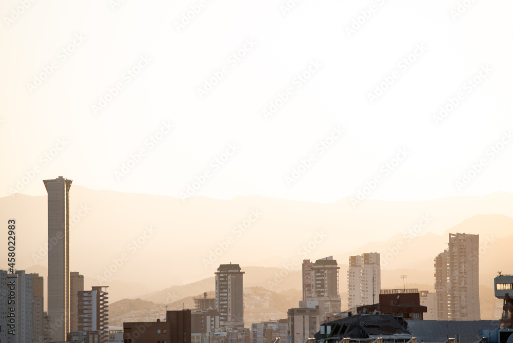 Fototapeta premium Coastal city at sunset