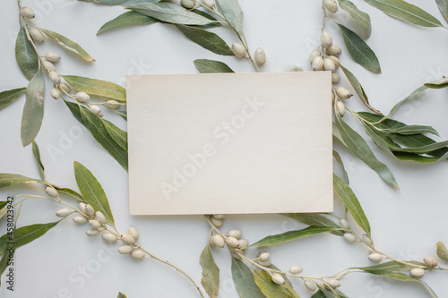 wedding invitation mockup  with decor and leaves. 