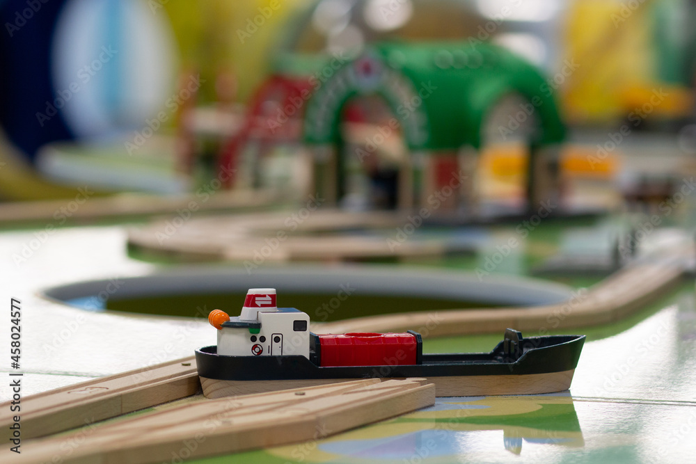 Toy wooden ship on playground for children Toy wooden ship on playground for children