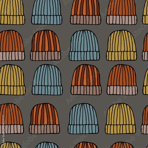 Warm hats seamless pattern on gray background