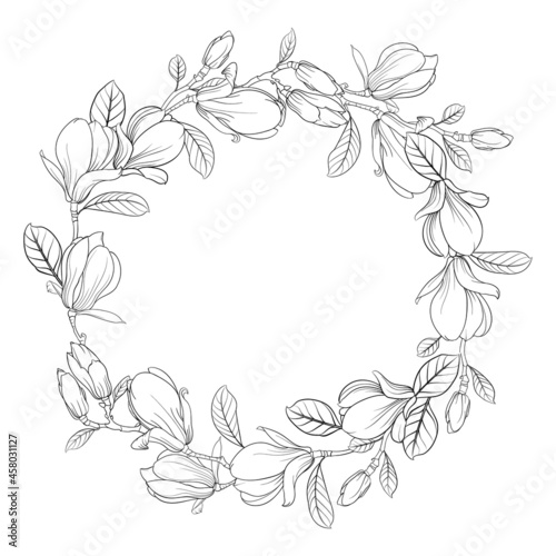 Round wreath of magnolia in black and white. Frame made of spring flowers.