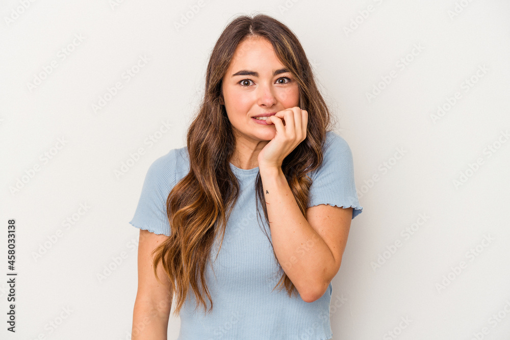 Young caucasian woman isolated on white background biting fingernails, nervous and very anxious. Young caucasian woman isolated on white background biting fingernails, nervous and very anxious.