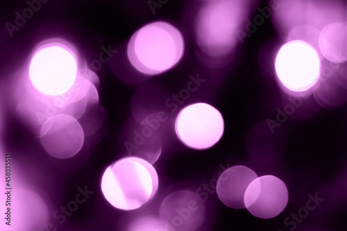 Blurred lights purple background. Abstract bokeh with soft light. Trendy color