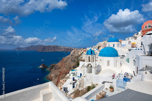 Santorini island  Greece. Incredibly romantic summer landscape on Santorini. Oia village in the morning light. Amazing view with white houses. Island of lovers  vacation and travel background concept