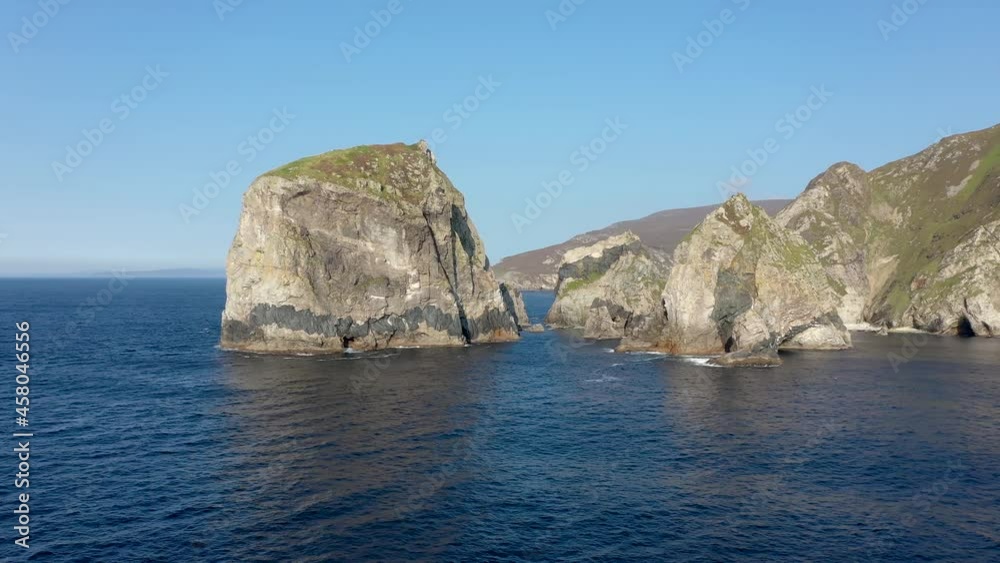 Flying towards Cnoc na Mara, the hidden stack and Tormore Island at Glenlough bay between Port and Ardara in County Donegal is Irelands most remote bay Flying towards Cnoc na Mara, the hidden stack and Tormore Island at Glenlough bay between Port and Ardara in County Donegal is Irelands most remote bay