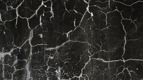texture of a black cracked wall, Horta, Azores