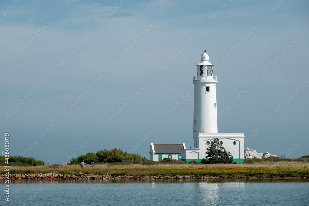 Hurst Point Lighthouse is located at Hurst Point in the English county of Hampshire, and guides vessels through the western approaches to the Solent Hurst Point Lighthouse is located at Hurst Point in the English county of Hampshire, and guides vessels through the western approaches to the Solent