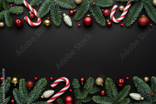 Black Christmas background with decorative frame