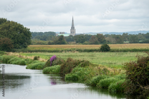 view of Chichester Cathedral along the canal at Poyntz Bridge in Hunston © Penny