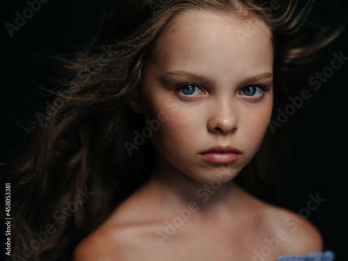 pretty girl posing fashion close-up dark background