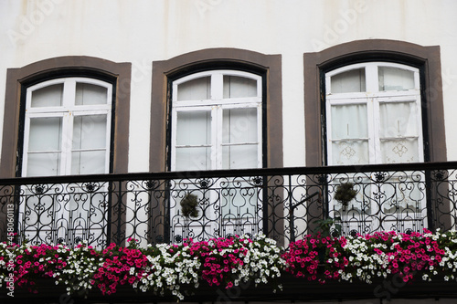 Flowered balcony in ancient palace in Angra do Heroismo, Terceira island, Azores