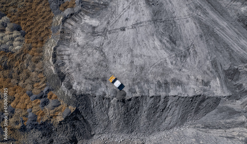 Wallpaper Mural Yellow truck Loading coal, in open mine, aerial drone top view Torontodigital.ca