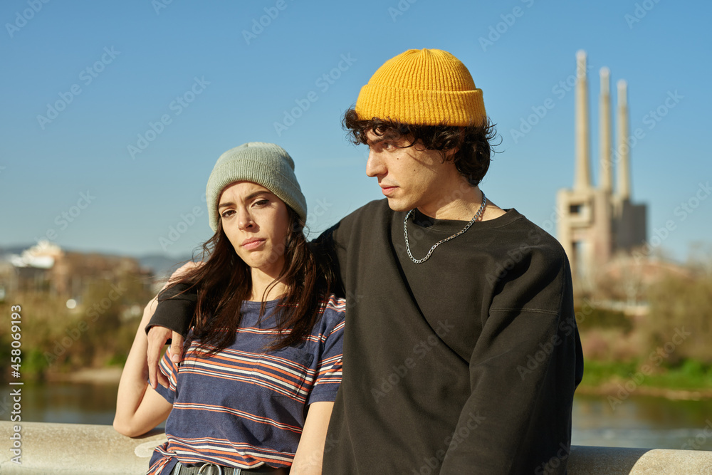 Attractive caucasian girl embracing guy outdoors Attractive caucasian girl embracing guy outdoors