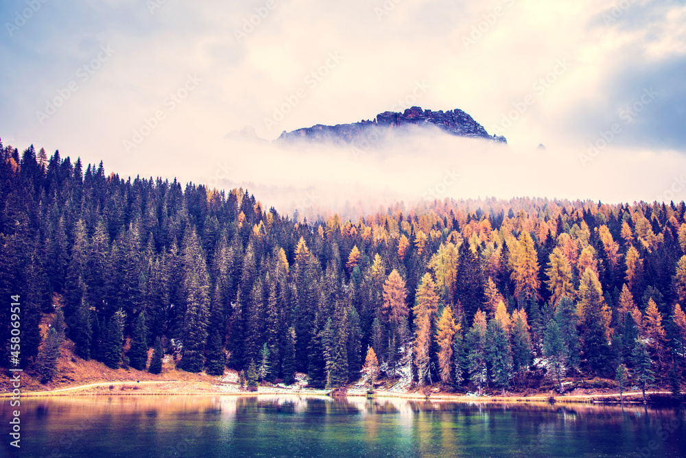 mystical beautiful autumn landscape near the lake on Fanes-Sennes-Braies natural park in the Dolomites in South Tyrol, Alps, Italy.
