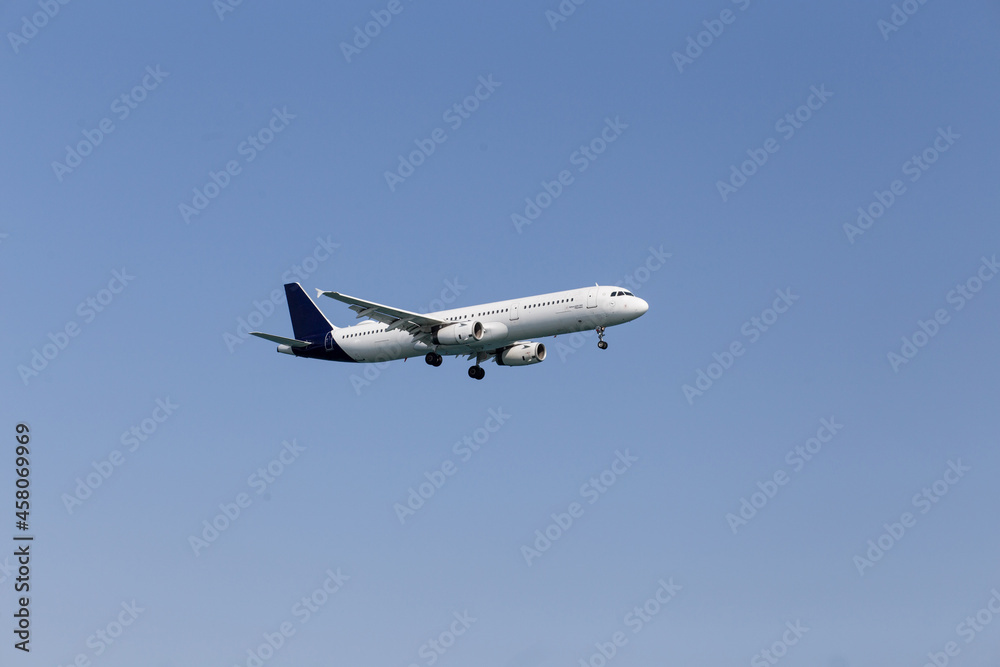 white passenger airlane flying in the sky white passenger airlane flying in the sky