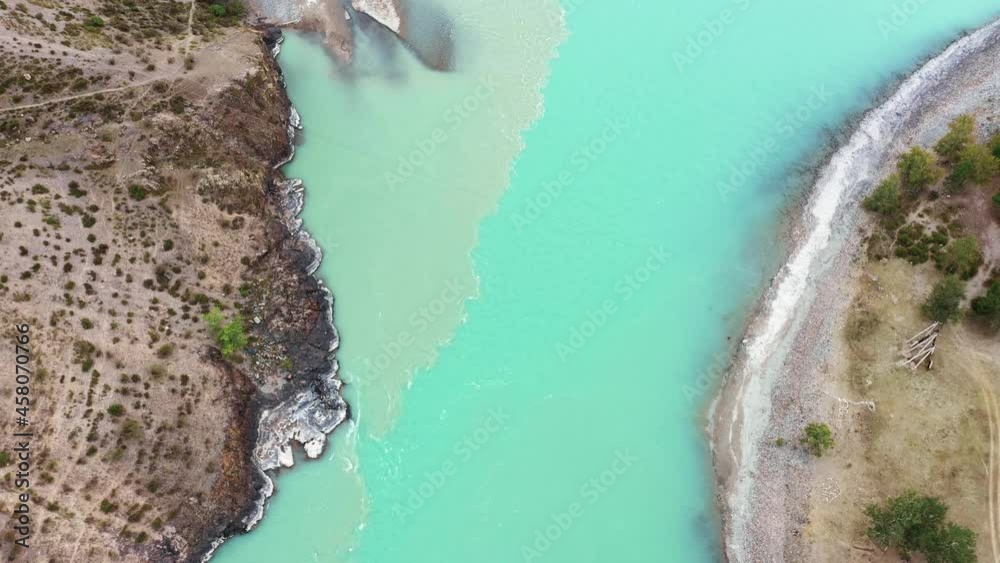 Aerial View Of Confluence Of Two Rivers With Different Water Colors Aerial View Of Confluence Of Two Rivers With Different Water Colors