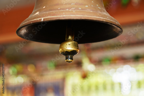 Indian Temple Decorative, Hindu Temple Bell Closeup , Brass made bell for Worshiping God, Ringing bell - Selective focus photo