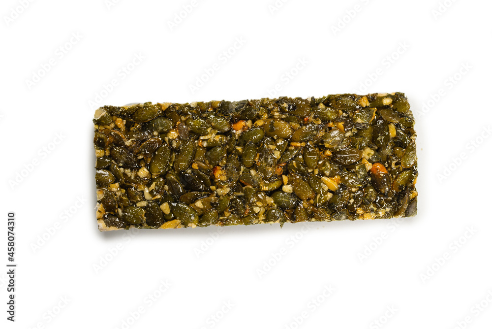 Bar with nuts isolated on a white background. Pumpkin seeds bar. Bar with nuts isolated on a white background. Pumpkin seeds bar.