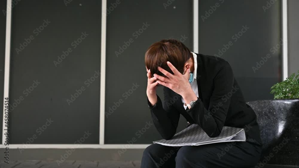 Unemployed businesswoman stressed after failure and laid off from work because impact from covid-19 pandemic outbreak and economic depression. Unemployed businesswoman stressed after failure and laid off from work because impact from covid-19 pandemic outbreak and economic depression.