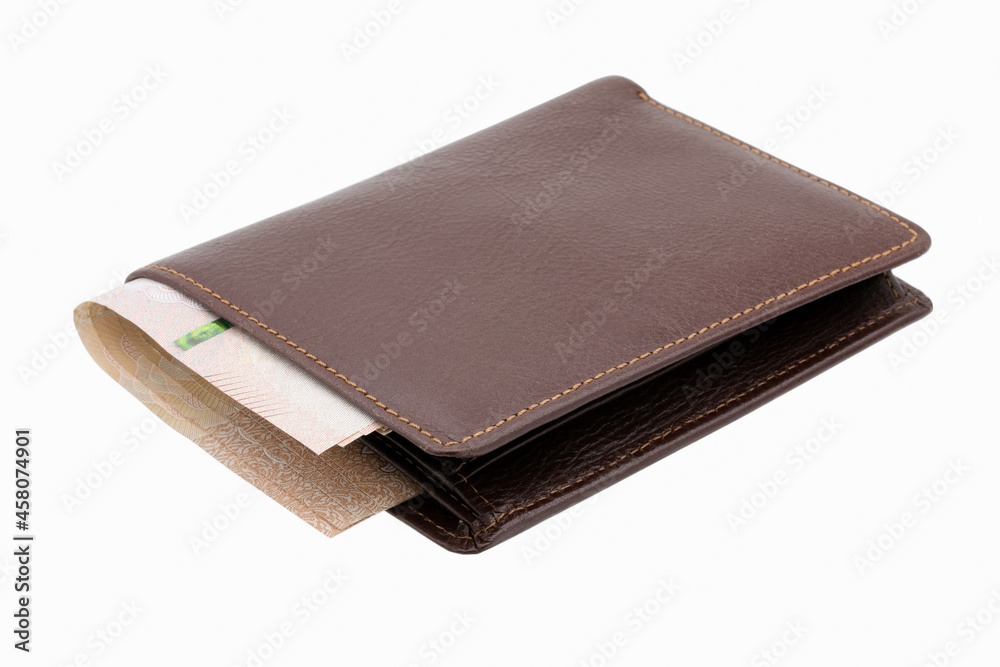 Brown genuine leather wallet with banknotes isolated on white background. Brown genuine leather wallet with banknotes isolated on white background.