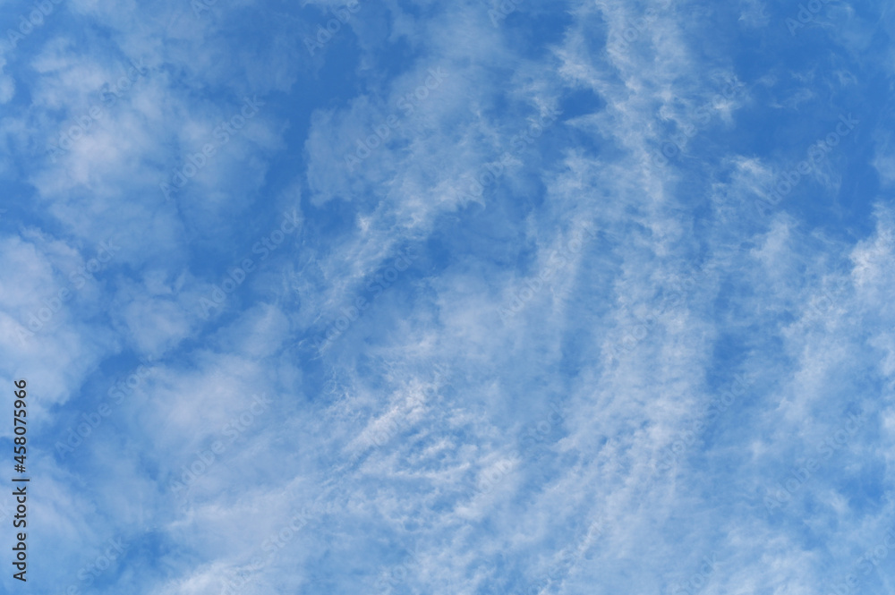 Blue sky background with white clouds on a sunny day Blue sky background with white clouds on a sunny day