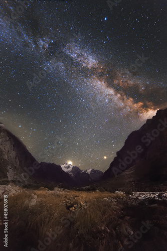 Milky Way over high mountains. Night photography. Night sky.