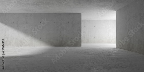 Abstract empty, modern concrete room with indirect lighting from right side wall, sunlight and rough floor - industrial interior background template