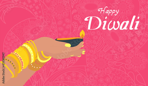 Diwali festival holiday banner. Hands hold traditional Dipa on a pink background. Vector illustration. photo