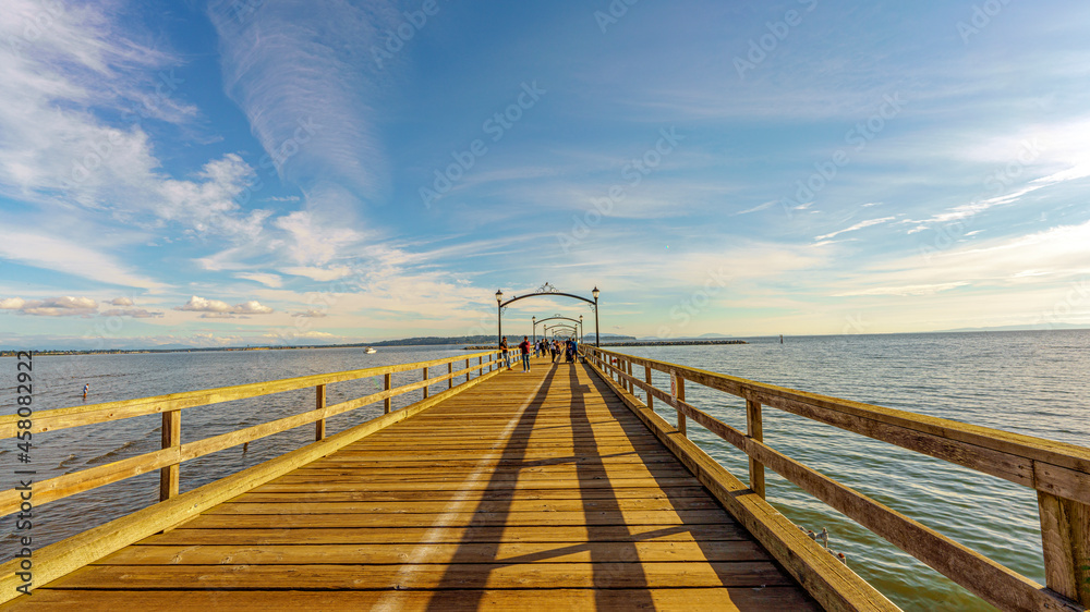 Perspective view of White Rock Pier, Canada's longest, on a late summer afternoon, with views across Semiahmoo and Boundary bays