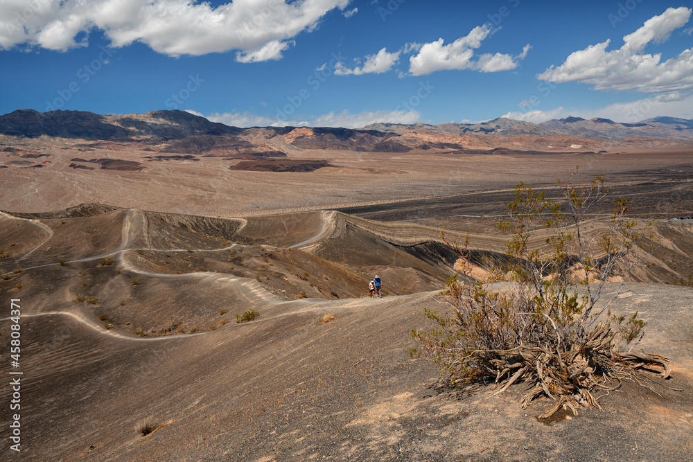 Desert hiking, Death Valley National Park. Amazing volcanic landscape, Ubehebe Crater view point.