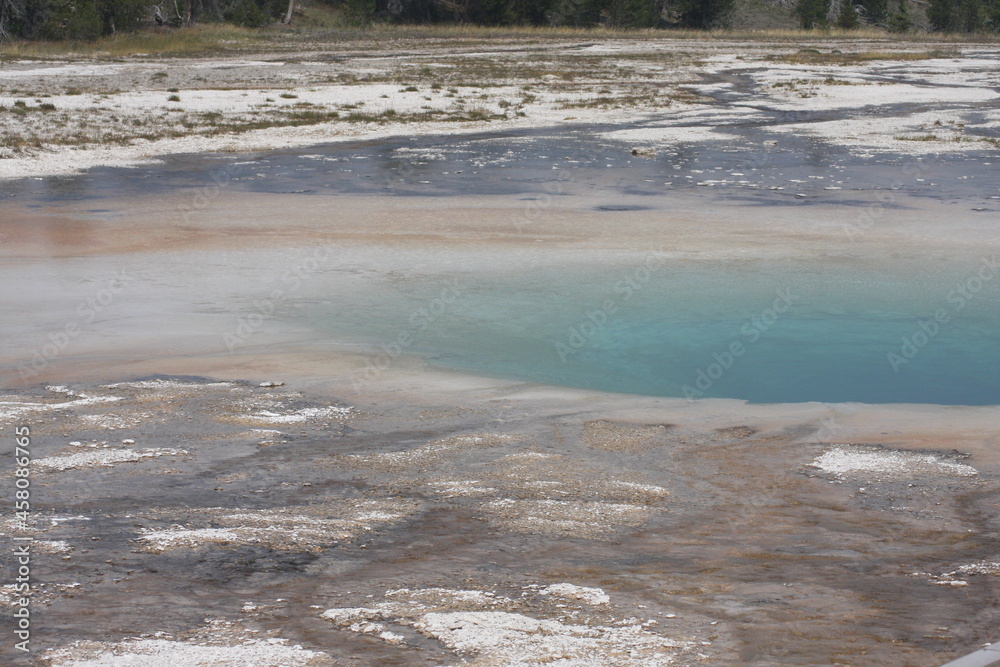 Geyser pool with forest
Yellowstone National Park Geyser pool with forest
Yellowstone National Park