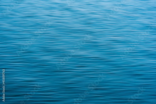 Fototapeta Naklejka Na Ścianę i Meble -  blurred blue water background with waves