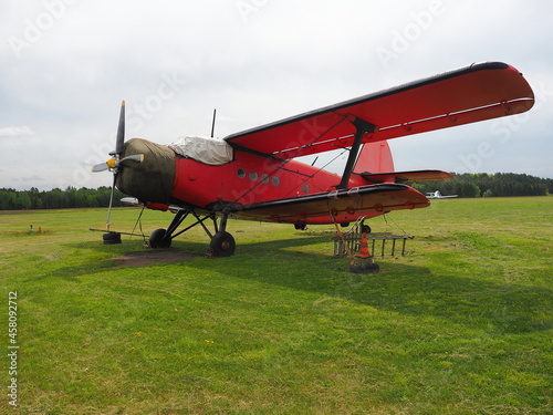 red, old propeller airplane  © Micha