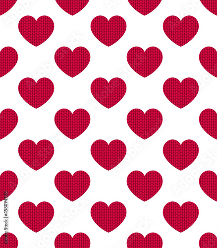 Seamless pattern of red knitted hearts.