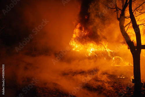 Burning car accident at night © Аrtranq