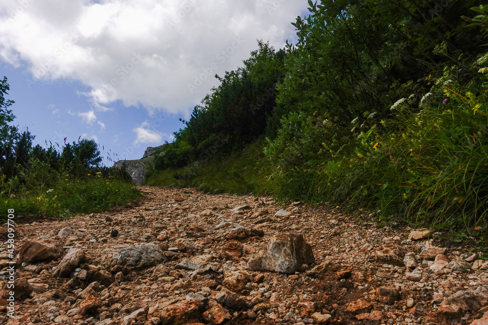 stony steep path while walking on a mountain