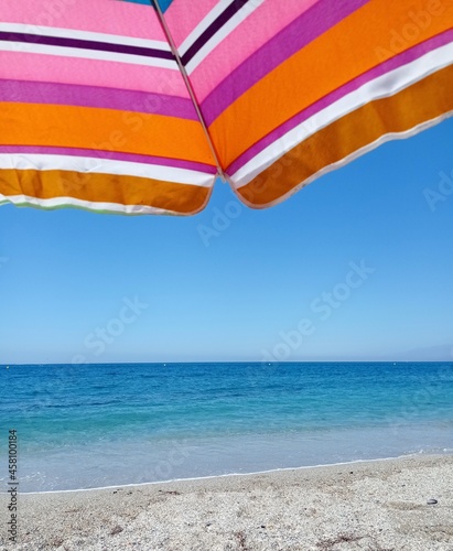 beach umbrella and blue sky