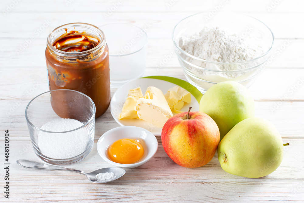 Ingredients for making apple pie on white table Ingredients for making apple pie on white table